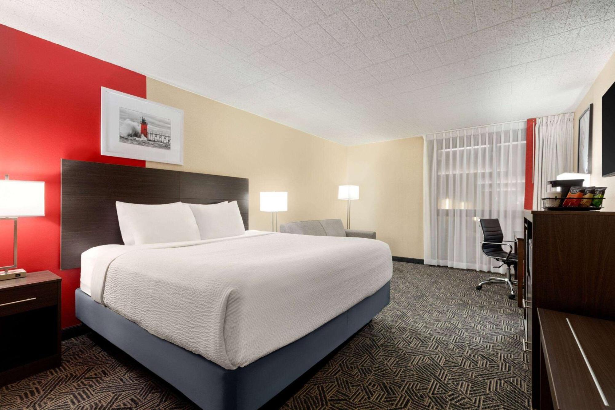 Hotel Ramada By Wyndham Alpena Esterno foto